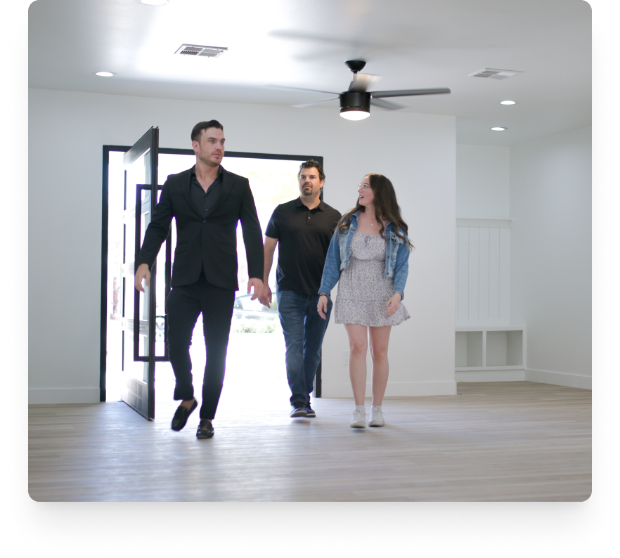 Friends walking through a home together
